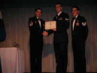 Receiving his Diploma (MSgt Canfield presenting, & instructor TSgt Hinkley