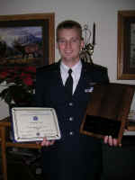 Jake with his Diploma & Levitow Award afterwards